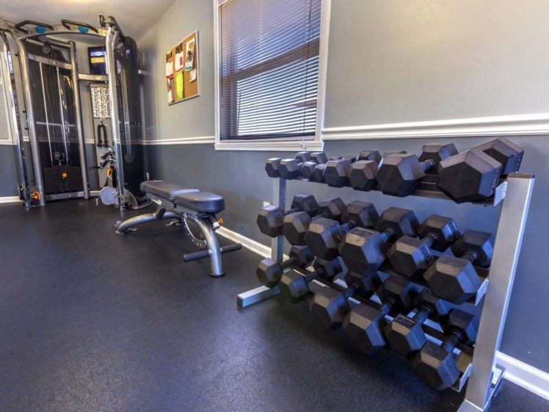 This image showcase the commercial fitness with State-of-the-art 2-level athletic club with Matrix Series 7xi equipment that is essential for community amenities and offering some high-quality cardio machines.
