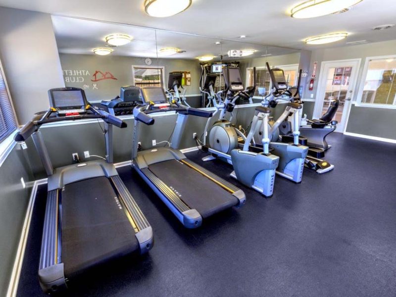 This image showcase essential community amenities. Offering 24-hour athletic club with virtual interactive programs. The club is also giving different weightlifting types of equipment, special abs equipment, and spin bikes that could fulfill the needs of fitness enthusiasts and professionals.